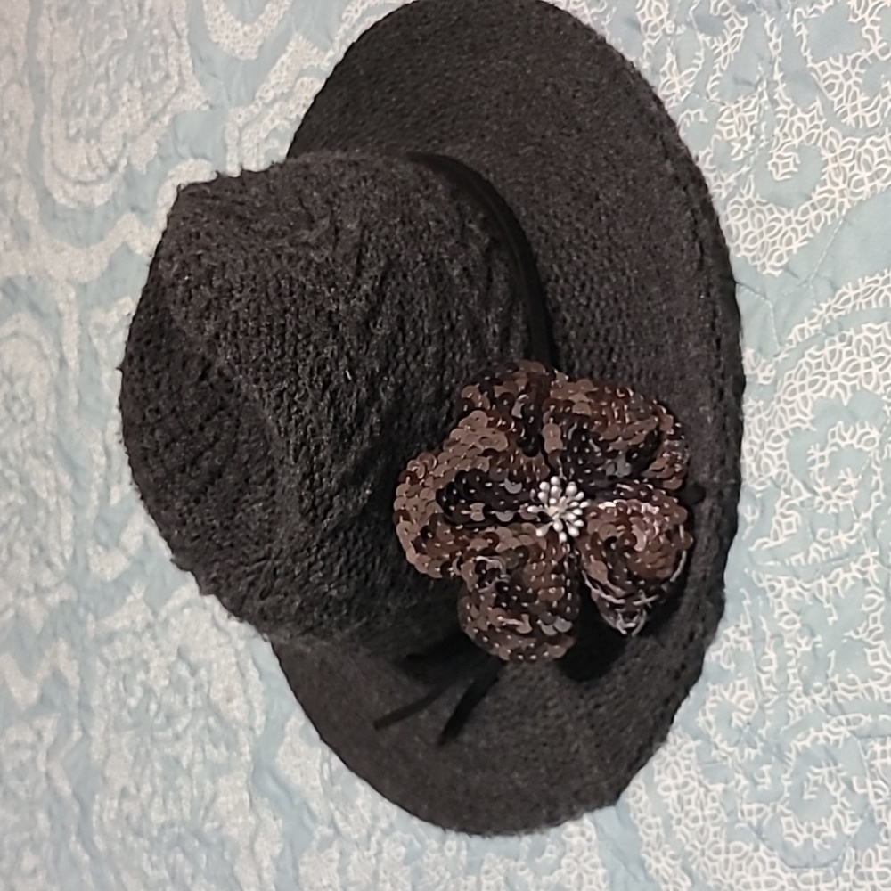 Gray knit hat with strappy leather band